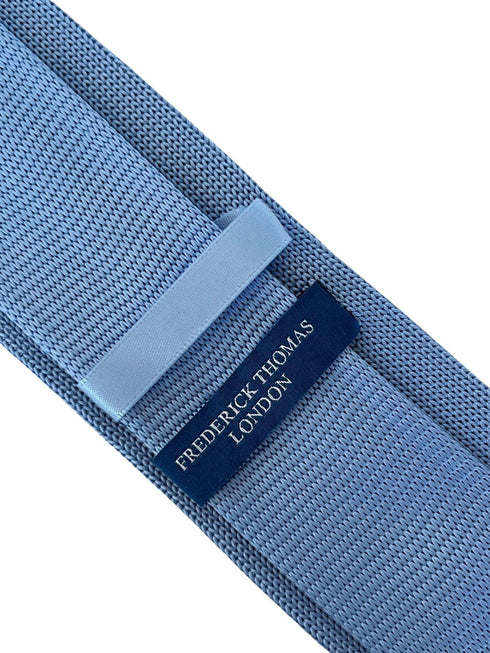 light baby blue knitted tie with nautical anchor embroidered design